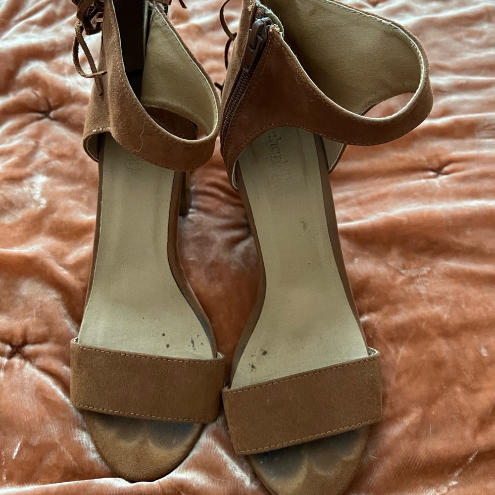 Brown heels with fringe detailing